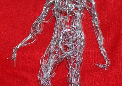 metaphor-steel-wire-man-standing